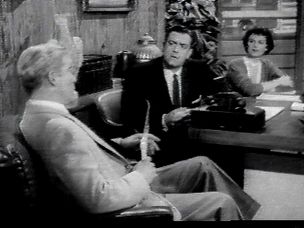 Amplicall on Perry Mason's desk
