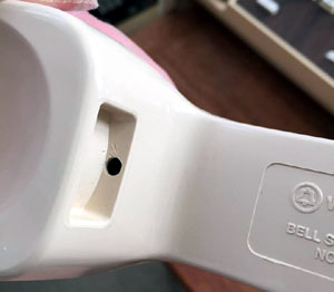 K2-type handset - screw access hole